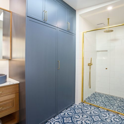 Custom colour matched blue joinery sprayed for a Hobart bathroom