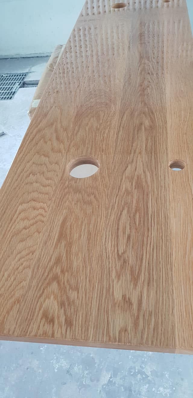 Oak benchtop with tap cut-outs, clear finished and ready for installation