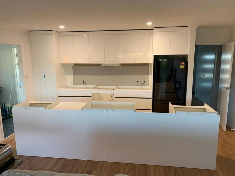 Builder's kitchen island and cabinetry finished ready for handover