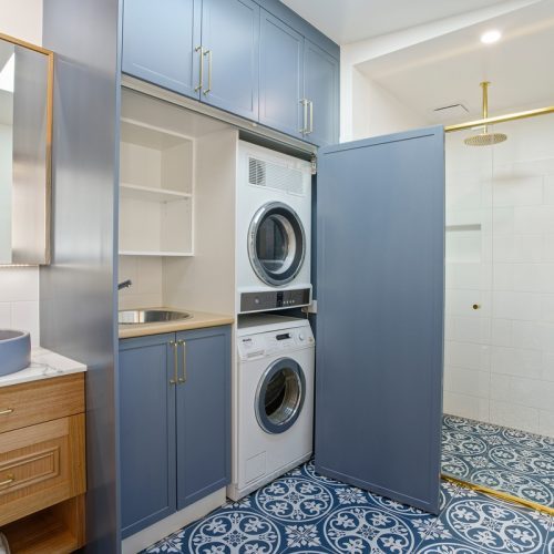 Colour matched blue laundry joinery spray finished in southern Tasmania